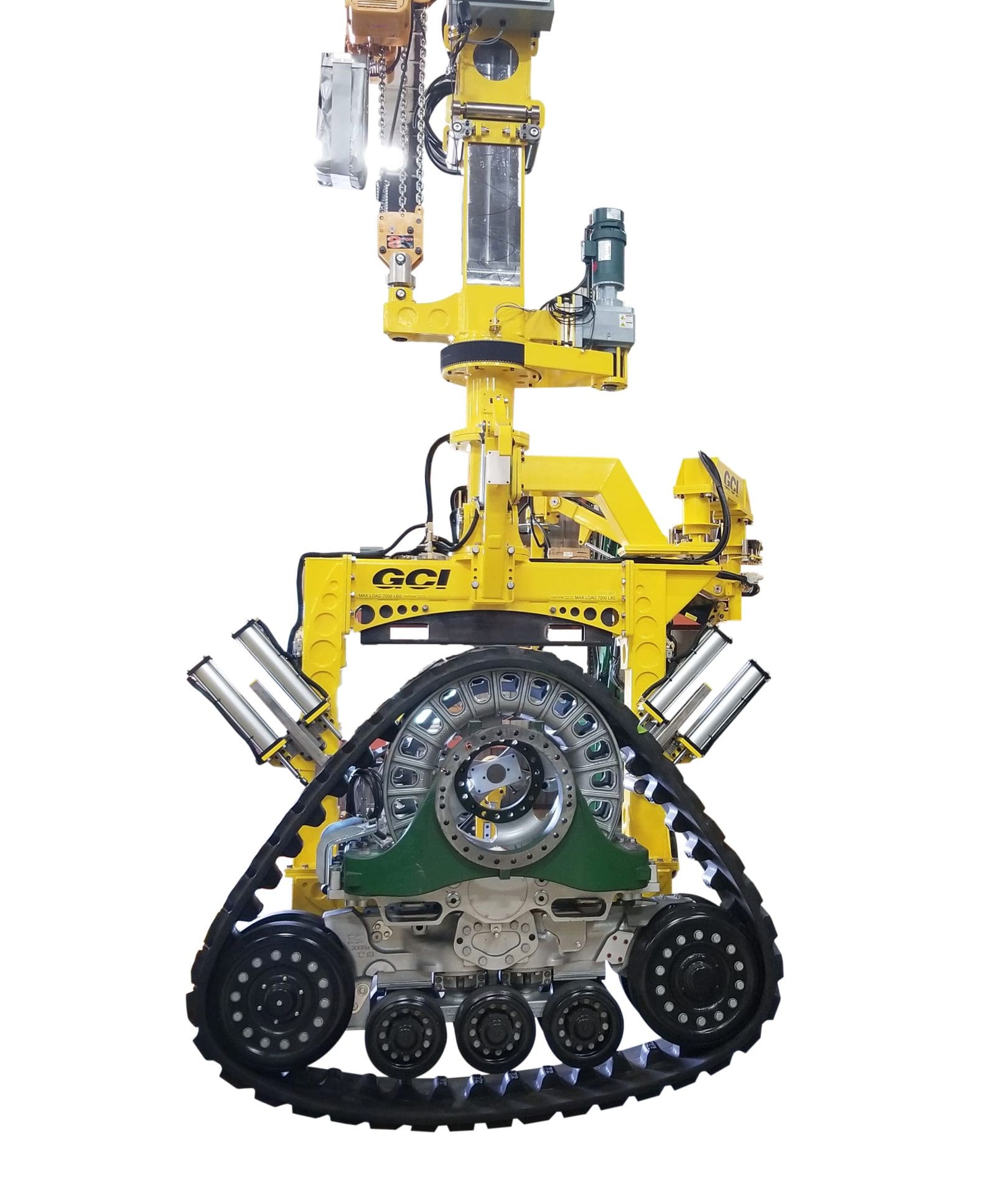 Image of a GCI manipulator lifting a massive 7,000 lb tractor track.